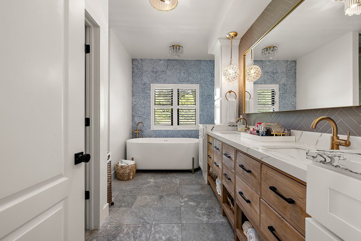 Finished bathroom vanity and tile ready for use.